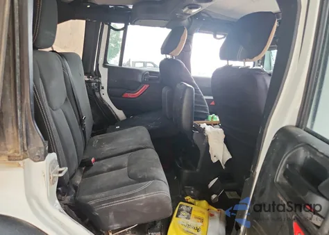 2016 Jeep Wrangler Unlimited Rubicon z USA, uszkodzony, nr VIN 1C4BJWFG8GL231976